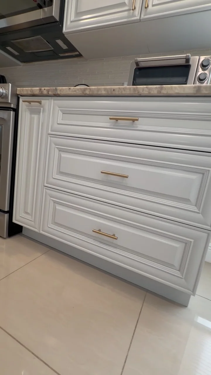 White cabinets with gold hardware