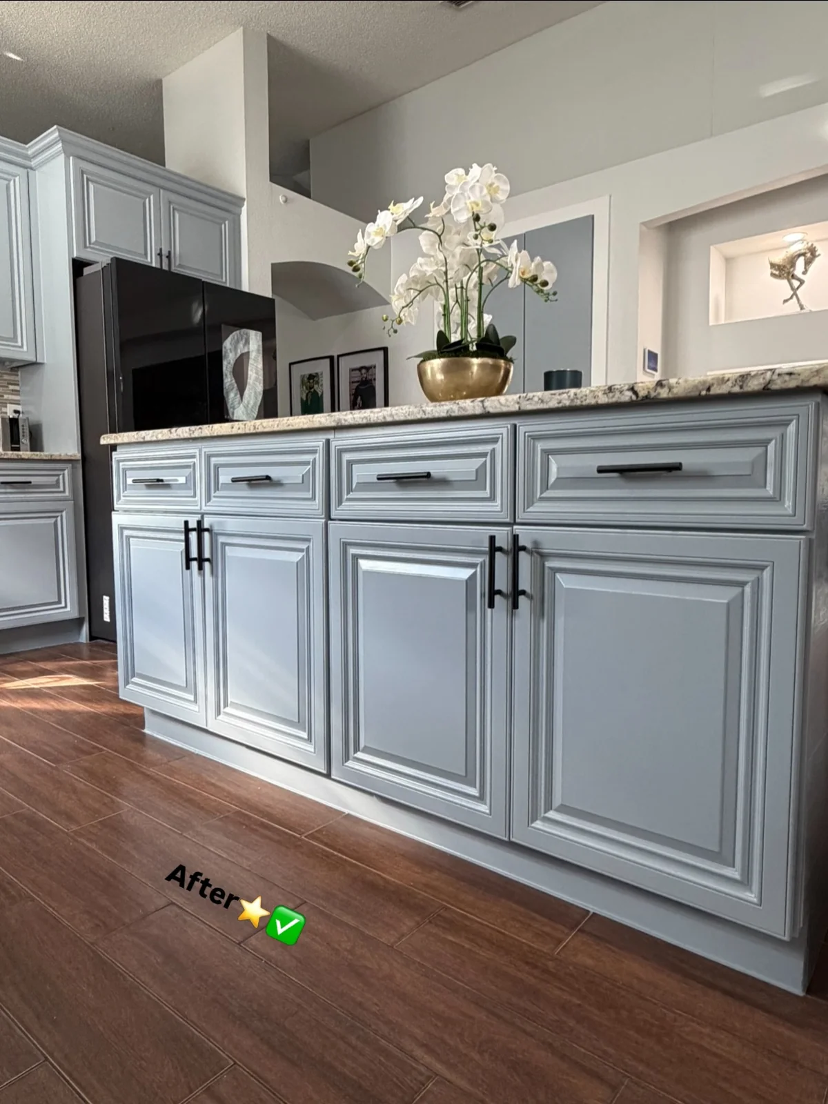 Kitchen with coastal-grey refinished cabinets