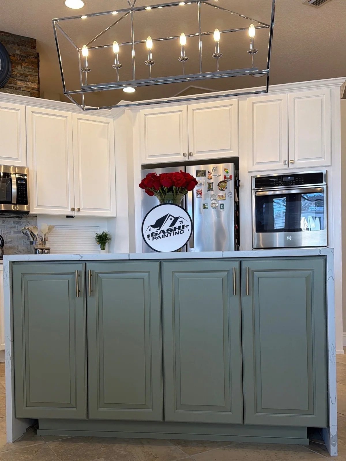 Sage-green island kitchen